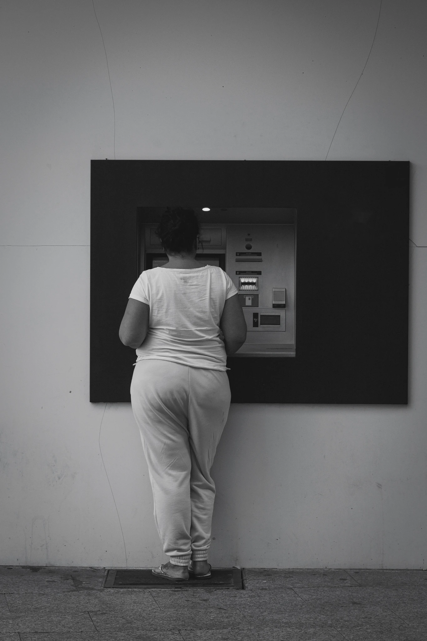 A researcher arranging notes and themes on a project board